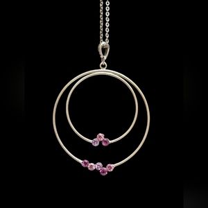 5 for $15.  Silvertone purple rhinestone circular pendent necklace